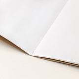Hojas de pequeña libreta de notas de papel de avellanas