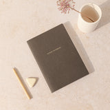 Pequeña libreta de notas de papel de cafe