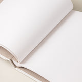 Comprar un libro de firmas y hacer un diseño bonito de album de fotos personalizado y con un proceso sostenible de papel reciclado cero waste.