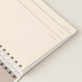 Detalle de planificador y agenda sostenible de papel reciclado